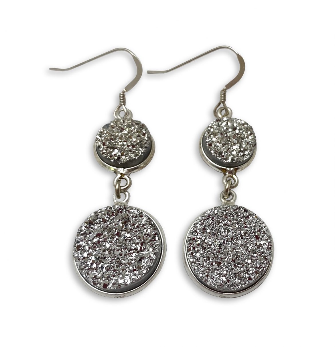 Silver-tone dangle earrings with glittery round and teardrop shapes.