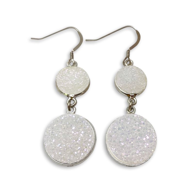 Silver dangle earrings with round glittery discs.