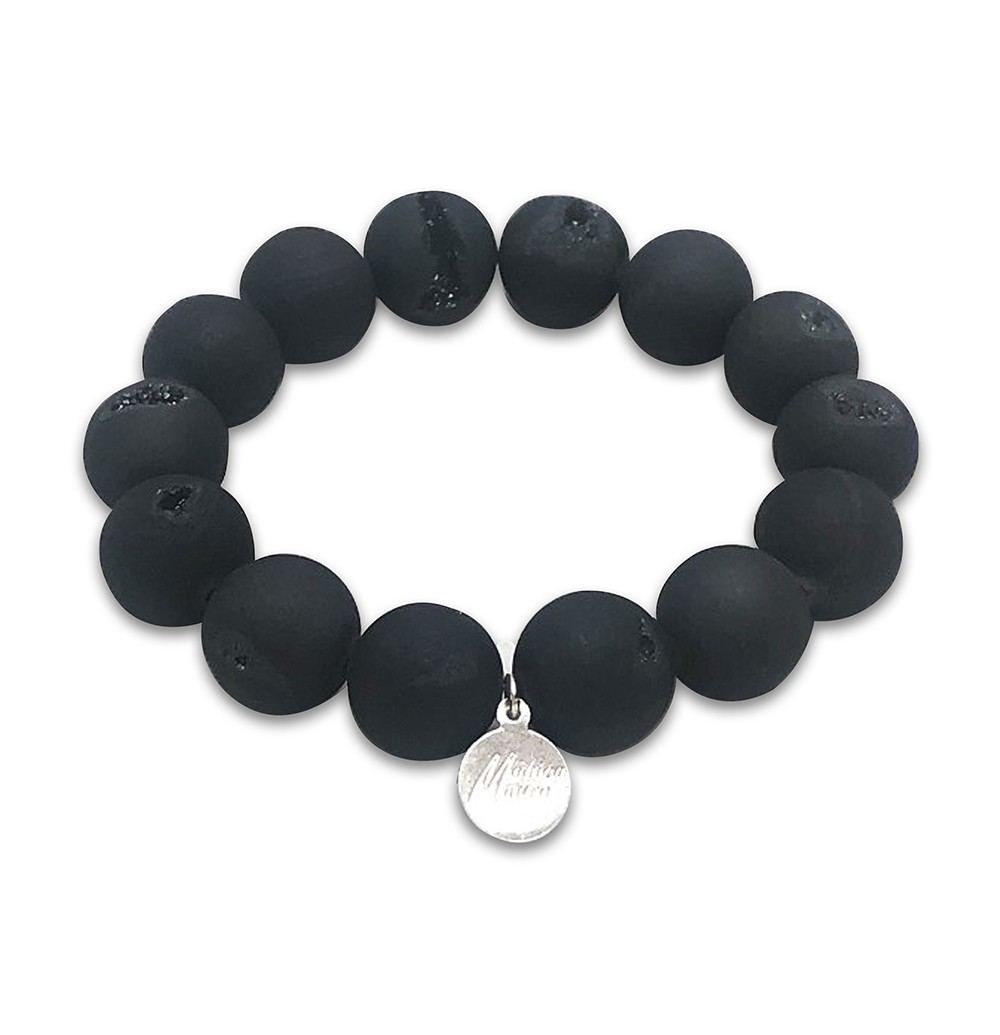 A matt black bracelet with a silver piece