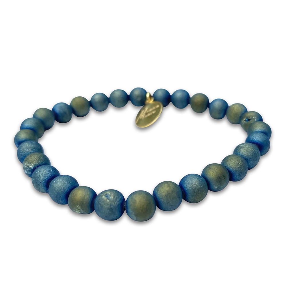 A necklace made of round blue-green beads with a small gold tag.
