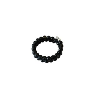 A black beaded bracelet with a single silver bead.