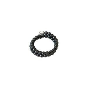 A black beaded ring with a coiled design.