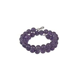 A purple beaded bracelet with a silver clasp.