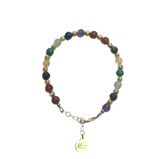 A multicolored beaded bracelet with a silver charm.