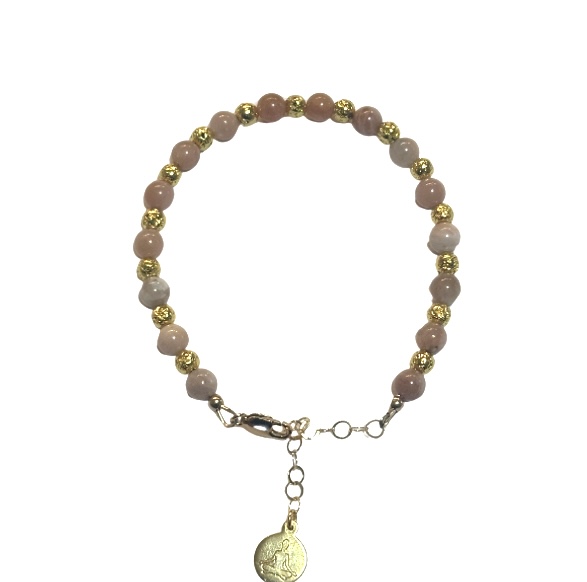 A beaded bracelet with a heart charm.