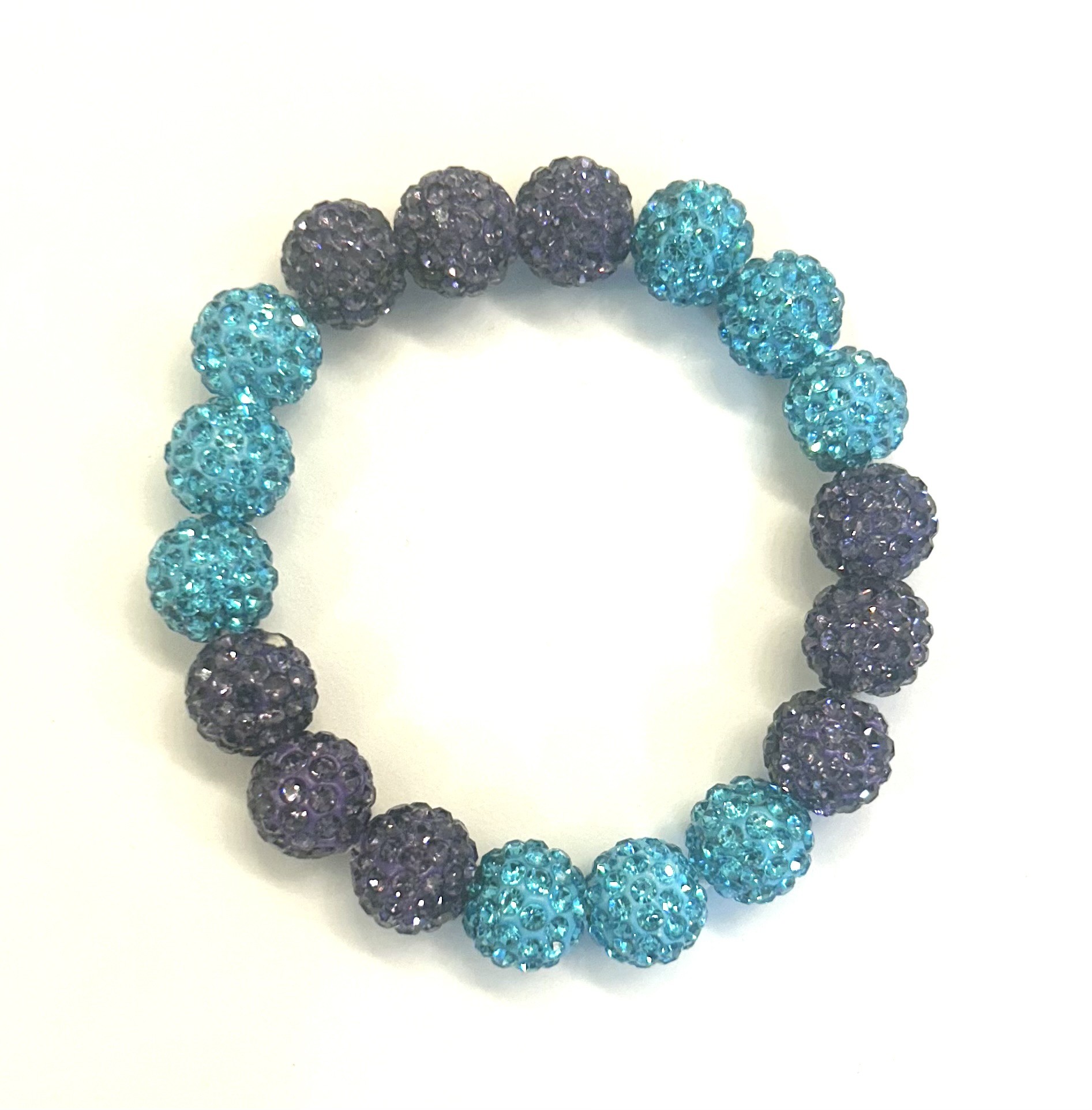 Blue and purple beaded bracelet on display.