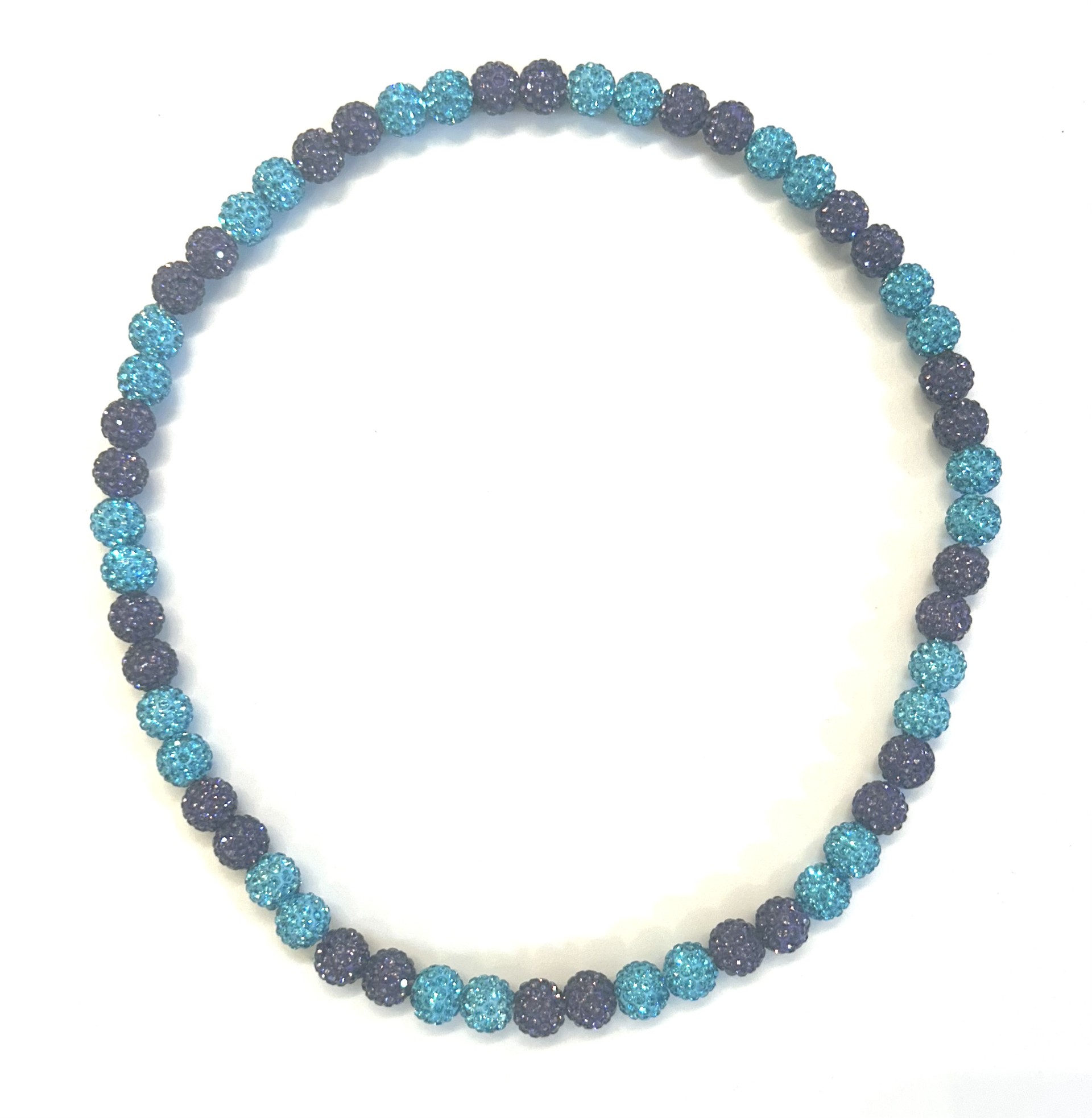 Blue and black beaded necklace on display.